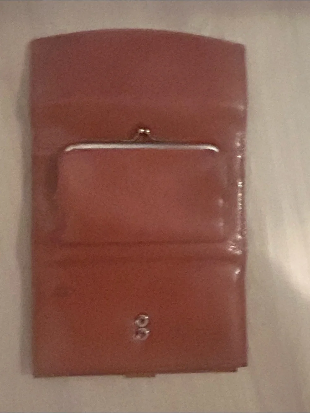 Rolfs brown leather card case with gold detail
